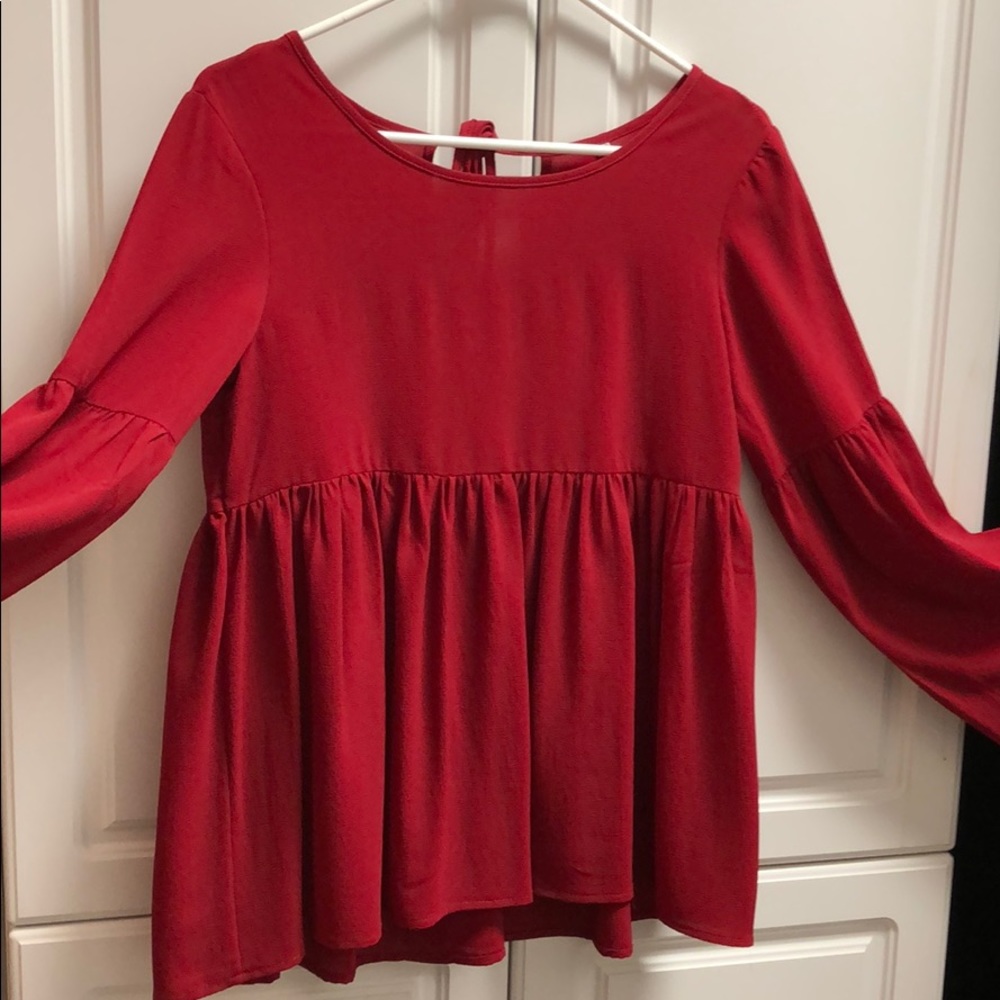 Red flowy top with bell sleeves